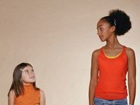 Why is puberty coming earlier for girls today?