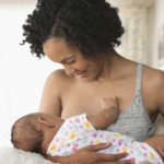 mom_breastfeeding_baby_at_home.jpg